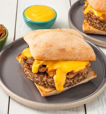 vegan mushroom burger with cheese sauce